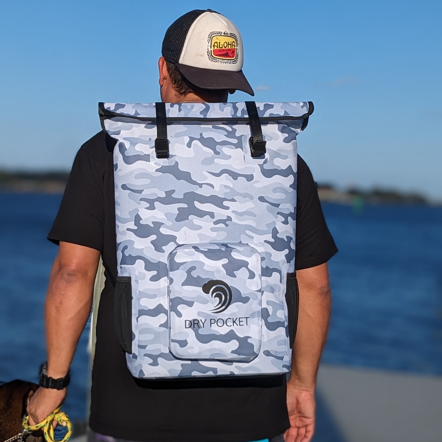 Dry Pocket - Waterproof Floating Cooler Backpack Dry Bag - Snow Camo - Man wearing backpack