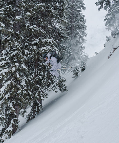 Strafe Outerwear - Nomad Jacket - Skier wearing jacket and catching air - Haze