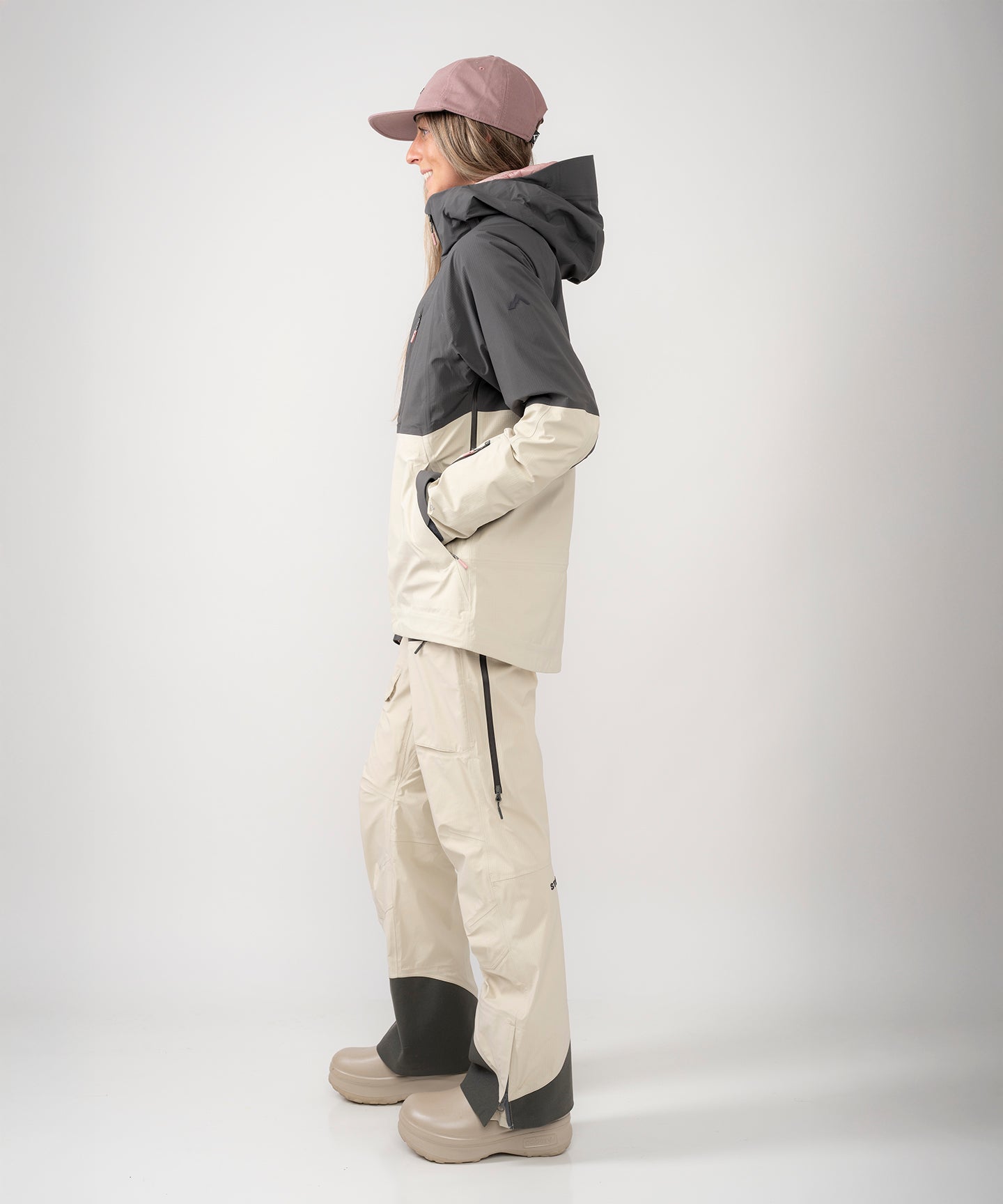 Strafe Outerwear - Meadow 3L Shell Jacket - Woman wearing jacket, left side - Light Khaki