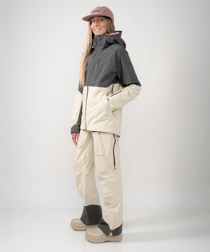 Strafe Outerwear - Meadow 3L Shell Jacket - Woman wearing jacket, front left side - Light Khaki