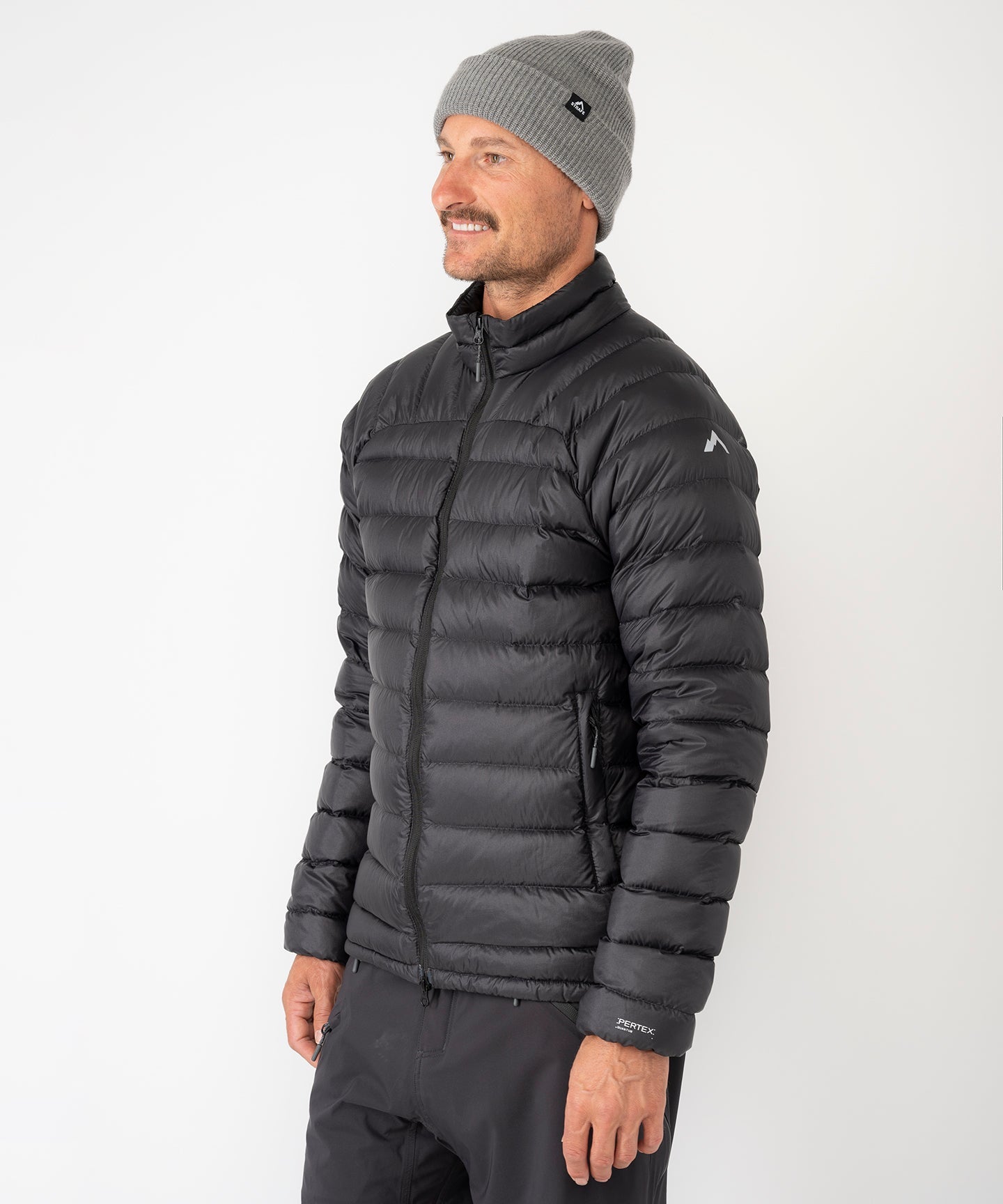 Strafe Outerwear - Palisade Down Insulator Jacket - Man wearing jacket, front left - Black