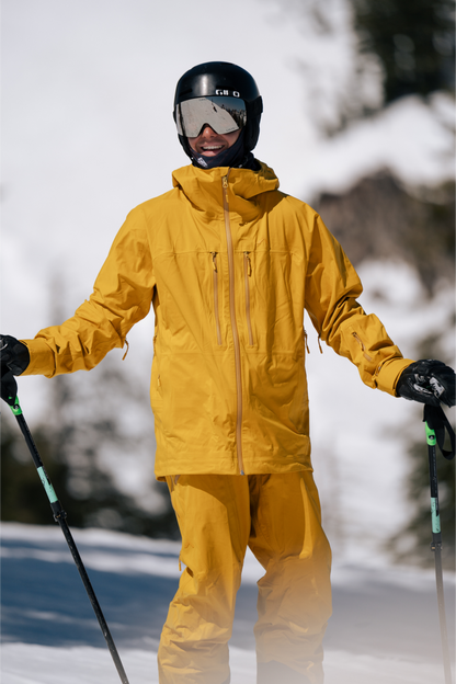 Strafe Outerwear - Pyramid Jacket - Standing with skis - Dijon