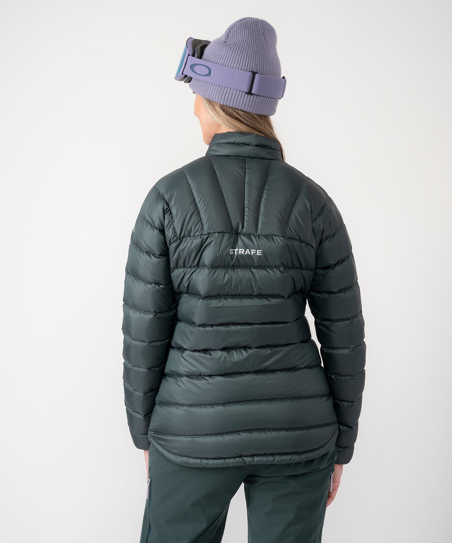 Strafe Outerwear - Palisade Down Insulator Jacket - Woman wearing puffy jacket, back - Deep Forest