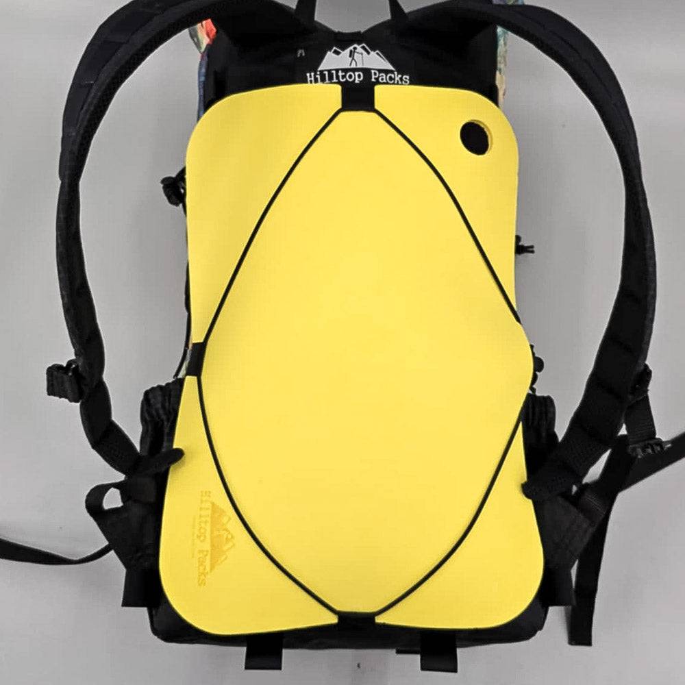 Hilltop Packs LLC - Ultralight Sit Pad - Yellow sit pad stowed on backpack