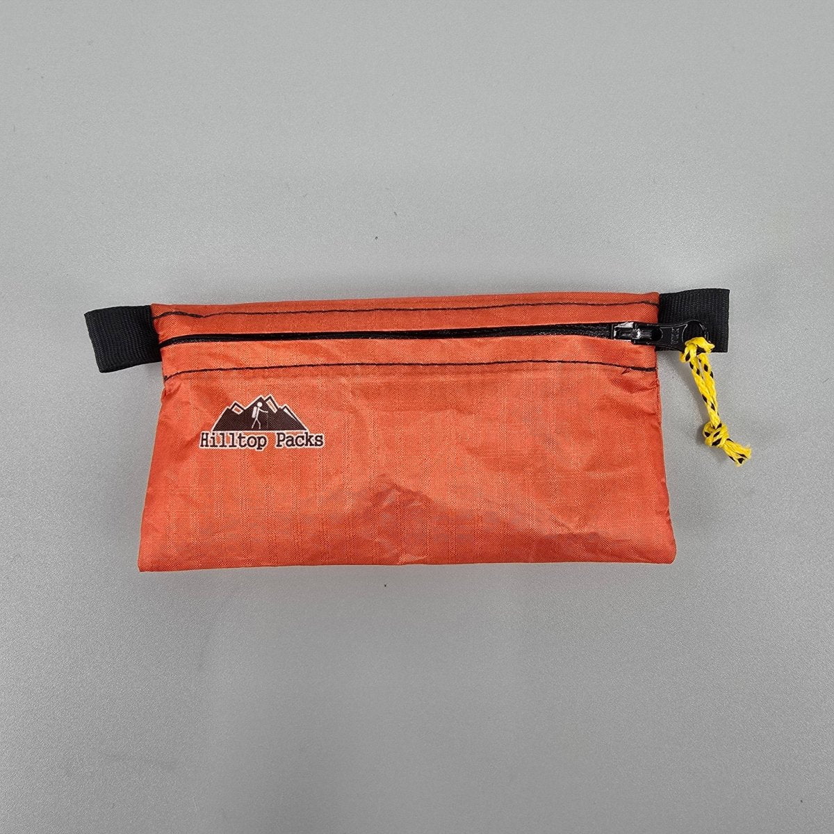 Hilltop Packs LLC - Ultralight Zipper Pouches - Classic Patterns - Challenge D50T Fabric - Orange, small