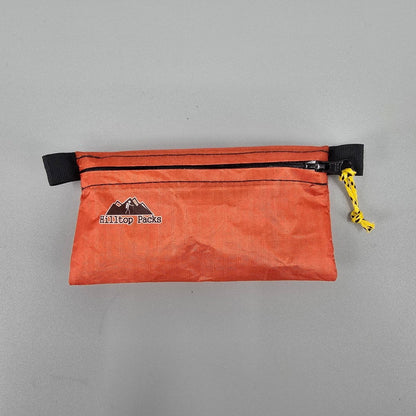 Hilltop Packs LLC - Ultralight Zipper Pouches - Classic Patterns - Challenge D50T Fabric - Orange, small