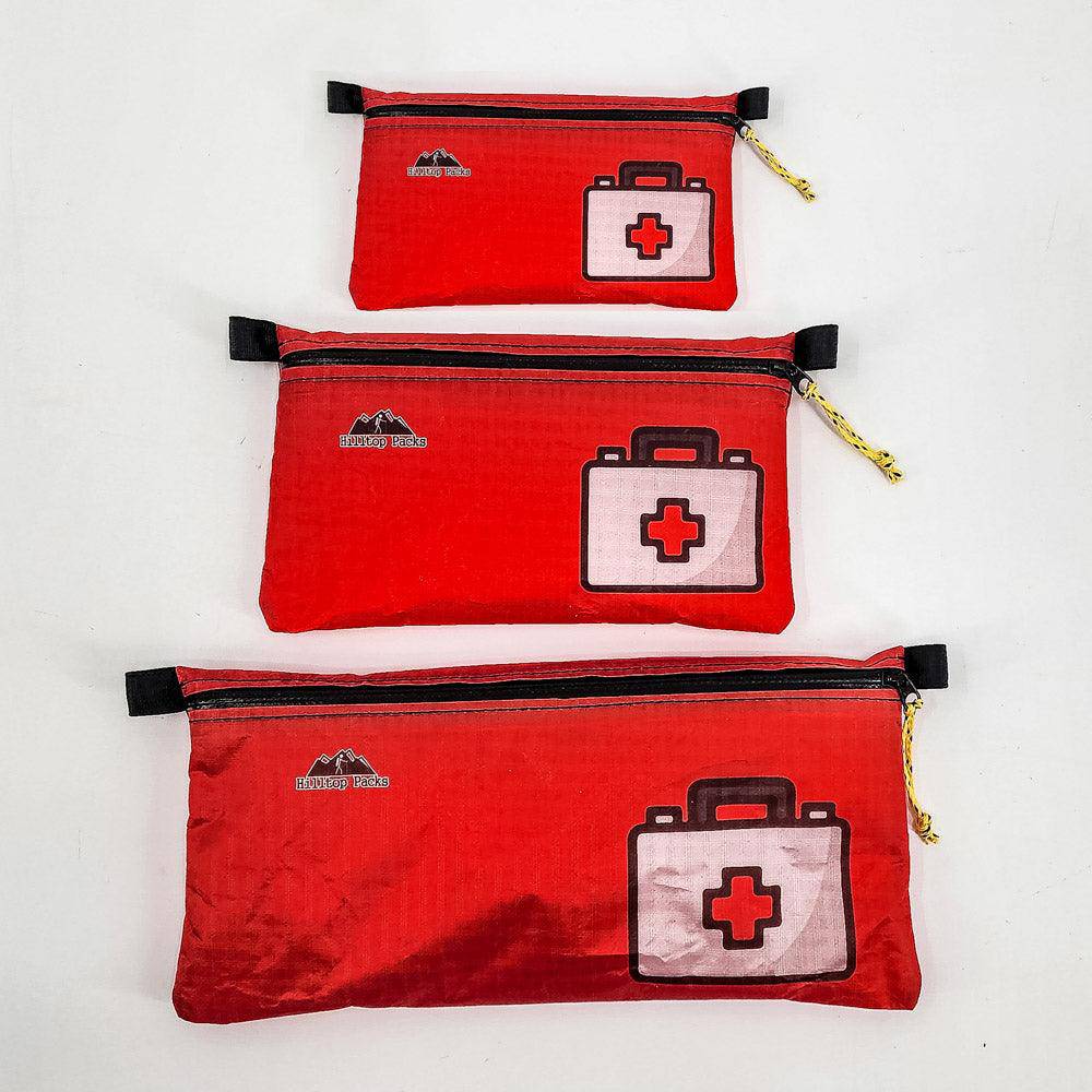 Hilltop Packs LLC - Ultralight Zipper Pouches - Classic Patterns - Challenge D50T Fabric - Red, med kit 1, small medium & large