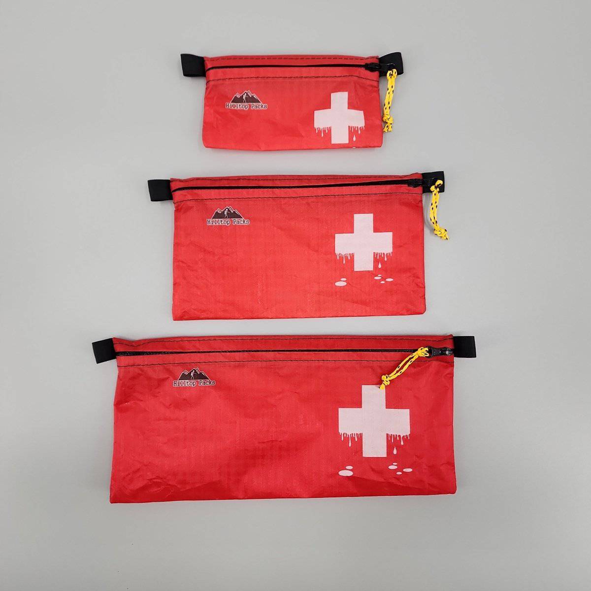 Hilltop Packs LLC - Ultralight Zipper Pouches - Classic Patterns - Challenge D50T Fabric - Red, med kit 2, small medium & large